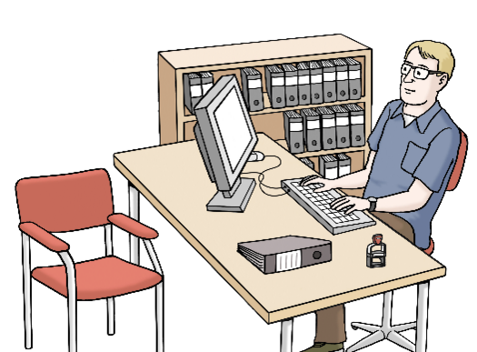 Ein Mann sitz vor einem Computer und arbeitet
